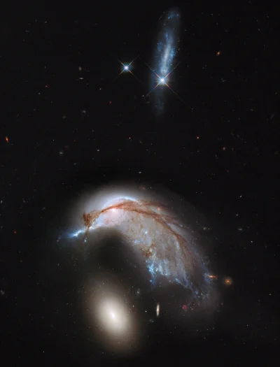 M.....t - Galaktyka już-nie-spiralna NGC 2936 "rozrywana" przez galaktyke eliptyczną ...