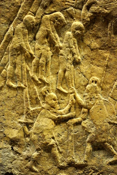 myrmekochoria - Asyryjscy żołnierze nabijający na pal wojowników z miasta Lachish