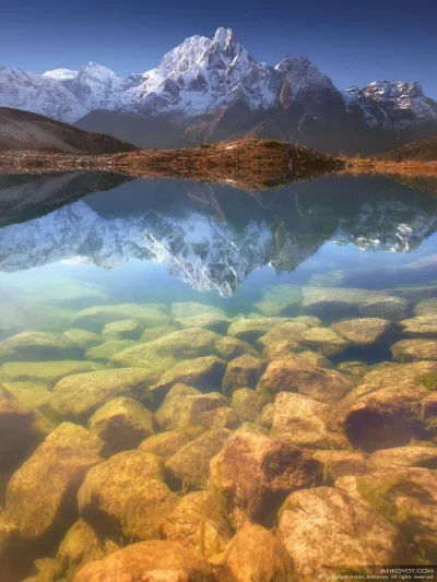 D.....k - Nepal, Manaslu Region, a reflection in the Bimtang lake (3,680 m) of the Ph...