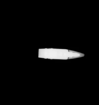 stahs - Obraz rentgenowski eksplodującego pocisku przeciwpancerno-odłamkowego projekt...