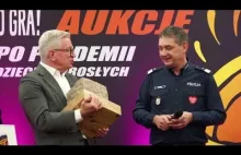 WOŚP Poznań licytacja historycznej kostki Prezydent Jaśkowiak osobiście zaniósł