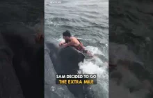 Man rides whale for all the right reasons