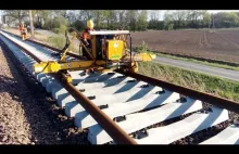 Układanie szyn na betonowych podkładach kolejowych w nieco wolniejszy sposób
