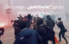 Narodowiec atakuje policjanta flagą Polski.