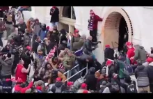 Trump supporters dragging a police officer down the steps & savagely beating him