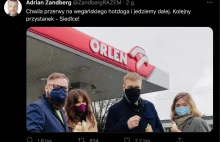Antykapitalista, czerwony socjalista Zandberg zajada się parówkami z Orlenu