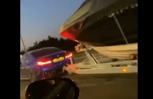 BMW M5 holujące łódź wciąż szybsze od Golfa GTI w wyścigu spod świateł