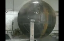 Explosively hydroforming a steel sphere