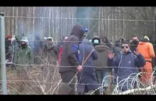 Imigranci masowo forsujący ogrodzenie na granicy polsko-białoruską [HD]