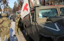 Żołnierze w Vorzel - flaga czerwonego krzyża + karabin maszynowy
