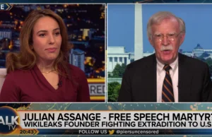 Assange’s Wife Stella Calls John Bolton A War-Criminal On Live TV -...