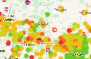 Kraków z zakazem palenia węglem i drewnem na tle wieczoru w regionie.
