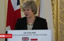 May's message to Poles in UK - in Polish