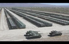Amerykańskie czołgi i ciężarówki oczekujące w porcie na wysyłkę do Polski
