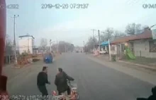 Scooterist blocking a big truck gets hit by another