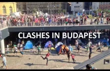 Hooligans vs refugees: Clashes at Budapest train station