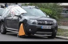 Clamping car in protest against clamping car. Zablokowany samochód prote...