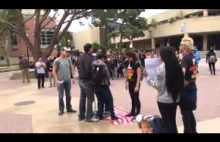 Disabled veteran defends the Flag against Flag Stomp