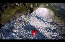 11 Wingsuit BASE Jumpers And 1 Unexpected Airplane