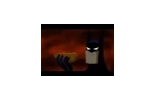 Batman zjada hotdoga.