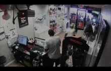 Robbers get locked in cellphone store, crowd watches and laughs