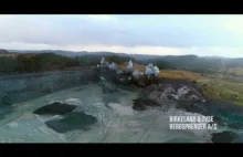 Kamieniołomy i widok z drona na wysadzanie skał ukazane w zwolnionym tempie