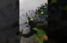 Yellow vests are attacking the police. The attack of yellow vests on the...