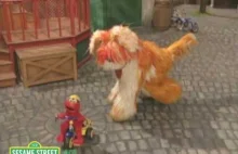 Sesame Street: Elmo Riding A Tricycle