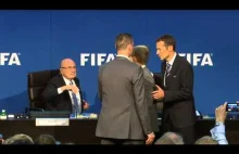 Sepp Blatter showered with dollar bills during FIFA press conference