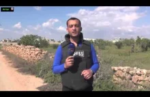 Syryjski dziennikarz trafiony odłamkiem na wizji[WIDEO]