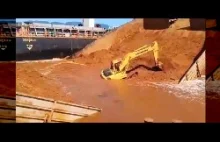 Barge Sinks With Excavator