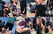Policjant bije pięścią kobietę na plaży. Miała kopać i opluć...