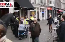 SZOK! Kobieta z dzieckiem w wózku aresztowana za noszenie żółtej kamizelki!