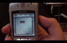 gameplay Pong game on old color BlackBerry smartphone