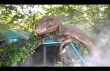 Dinosaurs attacking a car