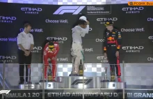 Lewis Hamilton po zwycięstwie w GP Abu Zabi pokazuje swój krzyż na plecach