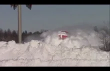 Train plows through heavy snow