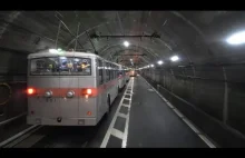 Linia trolejbusowa biegnąca tunelem i pod tamą Kurobe.