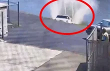 Watch Woman Drive Out Of Car Wash Directly Into River