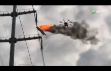 A Drone Uses Fire to Burn Trash Off Electrical Lines