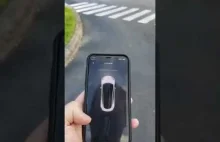 Tesla, przywołanie auta przez apke w telefonie