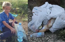 Węgierski chłopiec zbiera jedzenie wyrzucone przez imigrantów