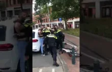 Holenderska Policja próbuje obezwładnić Polaka