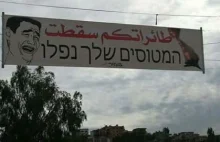 Baner wywieszony przez Libańczyków na granicy z Izraelem
